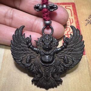 Tibetan thogcha iron pendant, Garuda protector amulet, celestial iron jewelry, traditional Tibetan craftsmanship, adjustable cord necklace, spiritual protection amulet, handmade ethnic jewelry, Buddhist symbolic pendant, cold iron thogcha artifact, Himalayan cultural accessory, antique finish pendant, negative energy ward, unisex spiritual gift, minimalist sacred design, ethical sourcing, holistic wellness jewelry, mystical Tibetan symbols, artisan crafted pendant, daily wear talisman, cultural heritage gift.