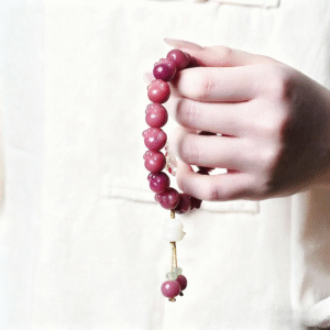 Close-up of Cat Paw Carving on Plum Bodhi Beads