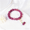 Wrist Shot of Plum Bodhi Bracelet with White Jade Accents