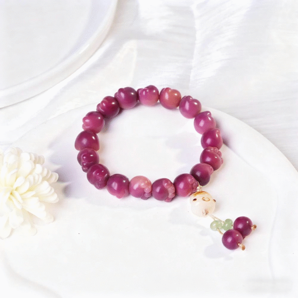 Wrist Shot of Plum Bodhi Bracelet with White Jade Accents