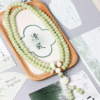 Celadon Bodhi Lotus Mala on Wooden Tray with Chinese Decoration