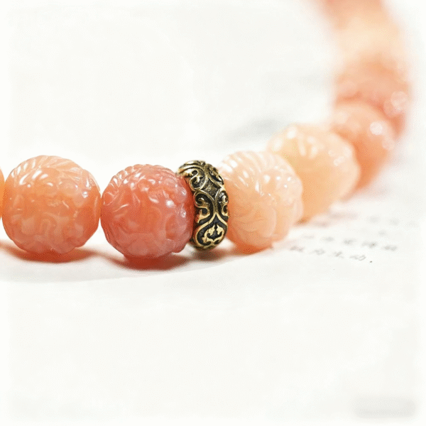 Detailed View of 13mm Pink Bodhi Beads and Metal Spacers