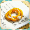 Yellow Double Strand Bodhi Bracelet Worn on Wrist