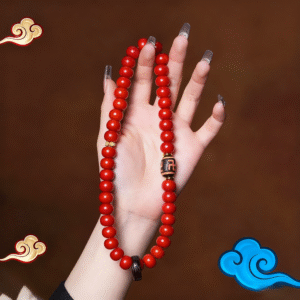Close-up of Red Bodhi Beads with Swastika Pattern and Pearl Accents