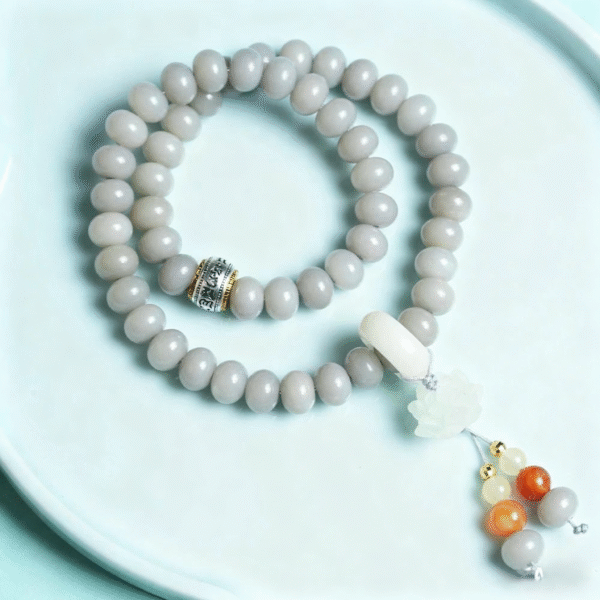Detailed View of Smoky Grey Bodhi Beads with Running Rings and Lotus Charm