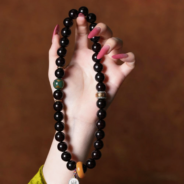 Close-up of Hand Holding Double Strand Bodhi Bracelet