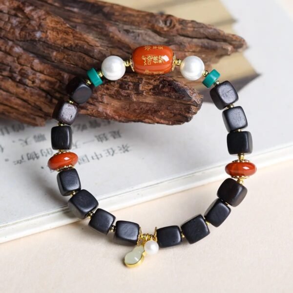 Dalargan agarwood bracelet, 10mm fragrant wood beads, natural agarwood jewelry, meditation aromatherapy bracelet, spiritual wellness accessory, sustainable luxury bracelet, therapeutic scent beads, ethical agarwood sourcing, mental clarity bracelet, grounding energy jewelry, resin-rich agarwood, artisan wood craft, daily mindfulness beads, spiritual gift idea, holistic lifestyle accessory, premium Dalargan wood, aromatic prayer beads, natural grain variations, eco-friendly spiritual wear, luxury wood bracelet.