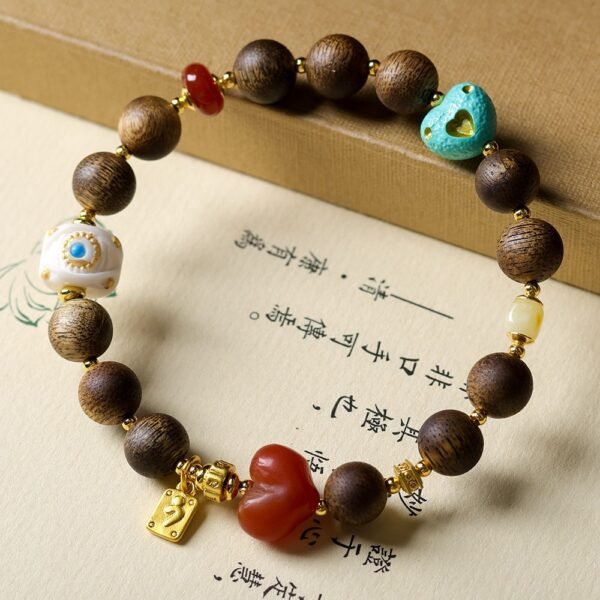 8mm Green Qinan agarwood bracelet, exquisite charm jewelry, handcrafted spiritual bracelet, meditation prayer beads, natural aroma therapy, ethical agarwood sourcing, symbolic charm design, elastic-free knotting, cultural symbolism jewelry, holistic wellness accessory, unique gift idea, artisan crafted mala, daily mindfulness jewelry, luxury spiritual wear, positive energy bracelet, eco-friendly materials, bohemian elegance, versatile layering piece, inner connection philosophy, meaningful jewelry.Temple consecration, house blessing, feng shui remedies, house pacification ceremonies, monk blessings, protective amulets, peace talismans, safety and peace assurance, wealth-invoking ceremonies, wealth deity statues, wealth-gathering formations, consecrated pi xiu (mythical creature), prayers and blessings, making vows, cultivating merit, peace and safety, imbuing objects with spiritual energy, infusing positive energy through sutra recitation, blessings, chanting mantras and dharani, liberation of deceased spirits, rebirth in the Pure Land, accumulating merit, nurturing compassion, devotional repentance, eliminating karmic obstacles, Buddha, Dharma, Sangha, portable guardian objects, peace-ensuring talismans, warding off evil spirits, neutralizing negative energies, averting disasters, deflecting misfortunes, Taiji and Bagua symbols. Buddhas: Dipamkara Buddha, Shakyamuni Buddha, Maitreya Buddha, Amitabha Buddha, Medicine Buddha, Akshobhya Buddha, Ratnasambhava Buddha, Amoghasiddhi Buddha, Five Dhyani Buddhas, Prabhutaratna Buddha. Bodhisattvas: Avalokiteshvara Bodhisattva, Manjushri Bodhisattva, Samantabhadra Bodhisattva, Ksitigarbha Bodhisattva, Mahasthamaprapta Bodhisattva, Guanyin, Wenshu, Puxian, Dizang, Maitreya, Akashagarbha, Vajrapani, Sarvanivarana-Vishkambhin.