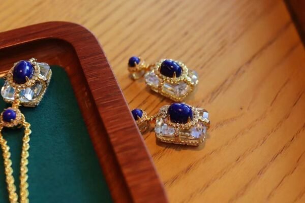 Natural lapis lazuli pendant, white crystal square necklace, S925 silver gold plated jewelry, handmade vintage necklace, luxury statement jewelry, hypoallergenic silver necklace, adjustable chain design, royal blue gemstone pendant, artisan crafted jewelry, versatile daily wear necklace, ethical sourcing, bohemian chic accessory, holistic wellness jewelry, cultural inspired elegance, affordable luxury, unique gift for her, modern classic style, special occasion jewelry, sustainable materials, timeless elegance.