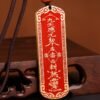 Thunder Command Amulet with red gold design