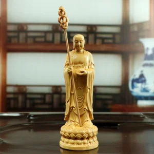 Boxwood Dizang Bodhisattva statue, hand-carved Buddhist altar ornament, 21cm standing Ksitigarbha, sustainable wood carving, detailed robe sculpture, lotus base statue, spiritual decor, traditional craftsmanship, eco-friendly religious art, meditation space centerpiece, cultural gift idea, serene Bodhisattva carving, home temple accessory, artisan woodwork, mindfulness symbol, ethical sourcing, Zen inspiration, collector’s spiritual art, compact altar statue, symbolic Buddhist gift.